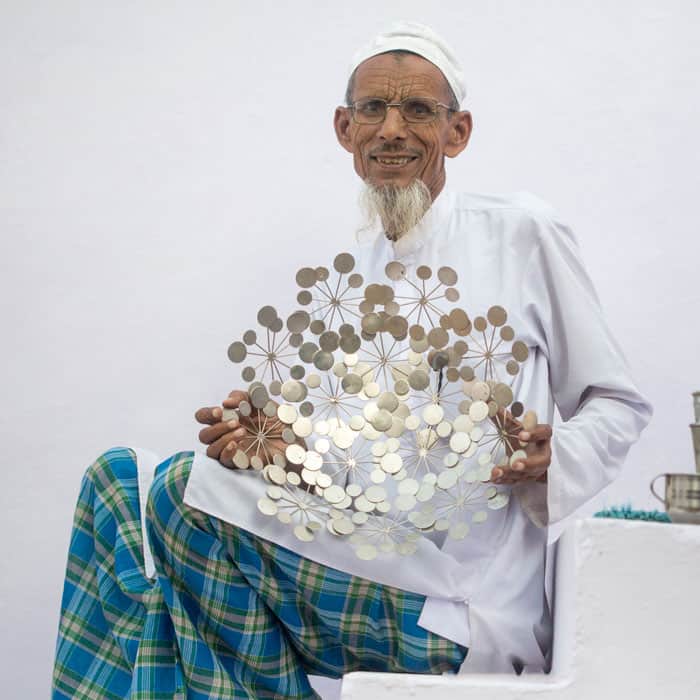 About us: A man with a metal plate.